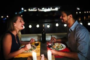 Couple enjoying dinner at one of the romantic restaurants on Cape Cod