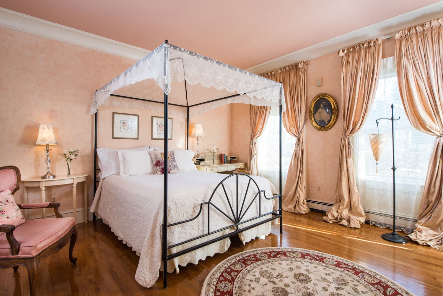 The bed inside the Captain's Quarters room at the Captain Farris House