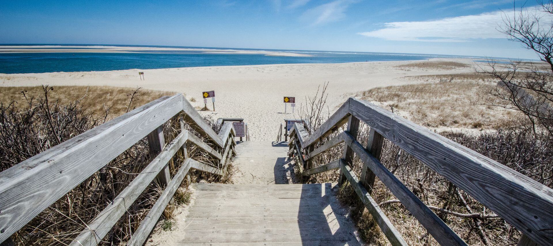 Wooden staircase leading down to the beach at Cape Cod National Seashore