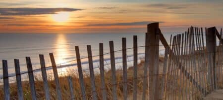 sunset over seashore on cape cod