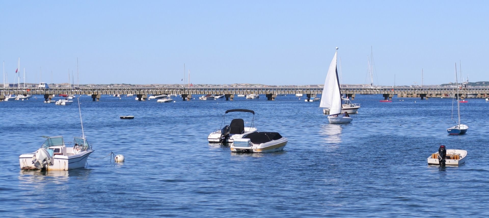 Several boats on the water in Cape Cod fishing