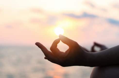 symbol of meditation during a sunrise